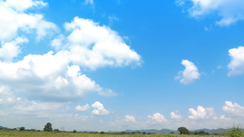 A man jumping slow motion and cloud sky background. happy with holiday or  vacation day in summer time.