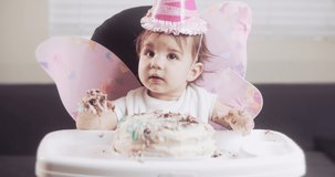 Baby girl celebrates her first birthday. Shot in RAW 4K on a cinema camera.