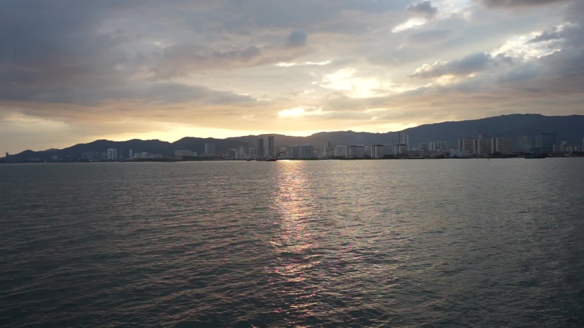 Georgetown cityscape at sunset in Penang, Malaysia. 