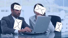 Digital composite of multi-racial man and woman talking in an office while digital envelopes fall in the foreground - Powered by Shutterstock - Get 15% off with code: PIKWIZARD15
