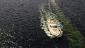 Aerial cinematic video boat leaving the harbor 4k