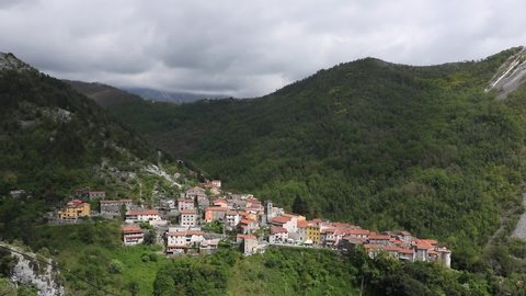 Colonnata, Carrara, Italy. -Panoramic shot of the village of Colonnata, where the famous lard is produced. The walls of the houses in stone and white Carrara marble. Marble quarries. Tuscany.