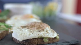 Breakfast with avocado toast and cream cheese