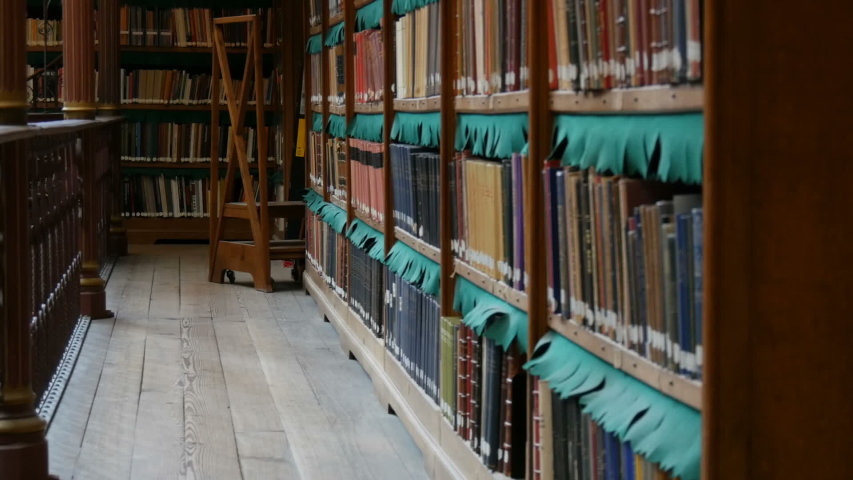 Beautiful vintage bookshelves in the old library in Rijksmuseum, Amsterdam
