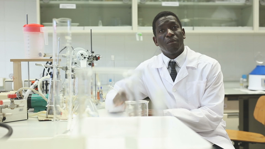 
Portrait of proffesional man lab scientists in interior of laboratory