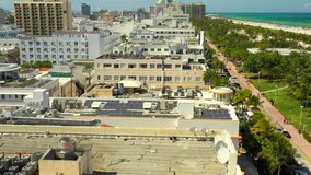 Aerial over Miami Beach art deco hotels on Ocean Drive 4k