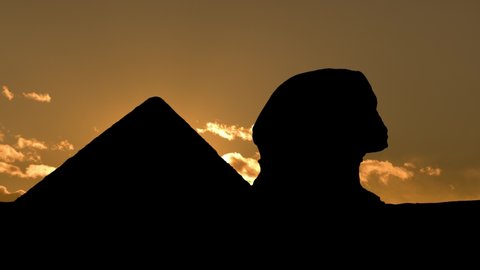 The Great Sphinx of Giza and a Pyramid, Sunset with Clouds Timelapse
