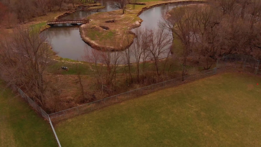 Aerial view of a winding river and walking trail in Wisconsin