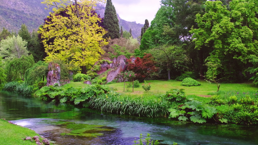 eden garden brook gushing on river stream water in autumn .