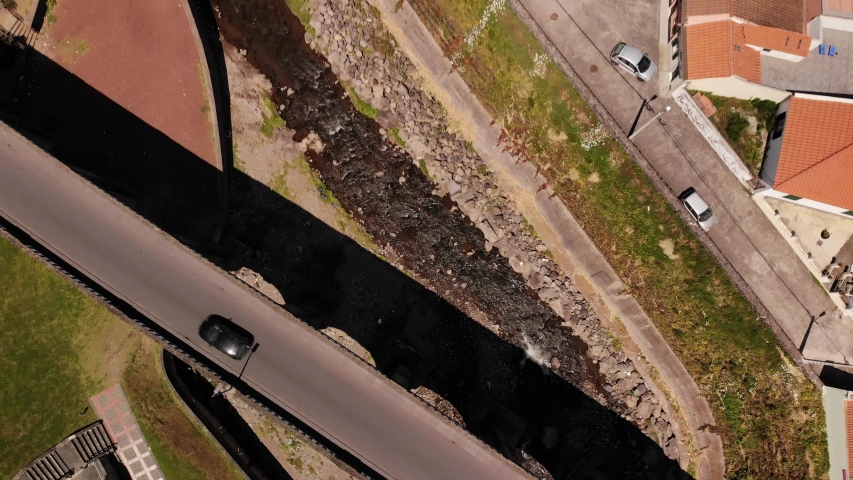 Top down view of bridge in small town