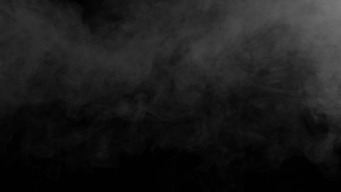 Smoke Jet Slowly Disappears. Gray smoke on a black background slowly dissipates and disappears from the screen