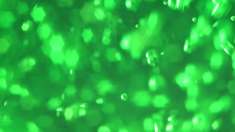 green liquid close up pours