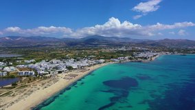 Aerial drone video of breathtaking turquoise sandy beach of Agios Prokopis, Naxos island, Cyclades, Greece