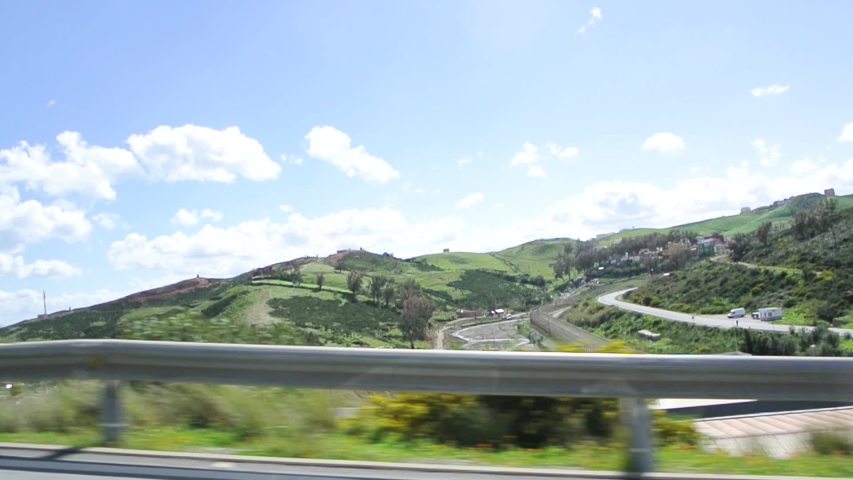 Ceuta, Spain View of hilly landscape and double fence with Morocco as seen from vehicle on the Spanish side known for violent assaults on the fence by groups of migrants attempting to enter the EU
