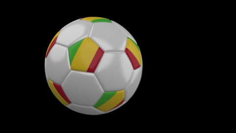 Soccer ball with flag Mali flies past camera, slow motion blur, 4k footage with alpha channel