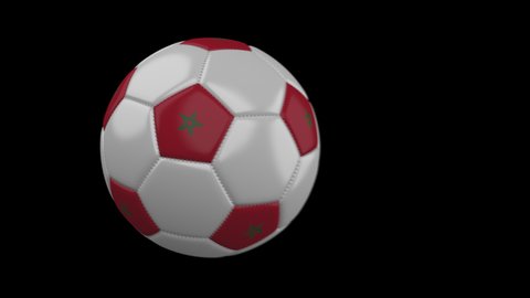 Soccer ball with flag Morocco flies past camera, slow motion blur, 4k footage with alpha channel
