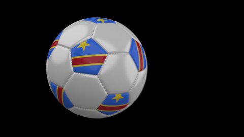 Soccer ball with flag Democratic Republic of Congo flies past camera, slow motion blur, 4k footage with alpha channel