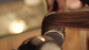 Client having their hair dried and curled by Hairdresser | SLOW MOTION