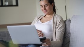 Pregnant woman doing online shopping 