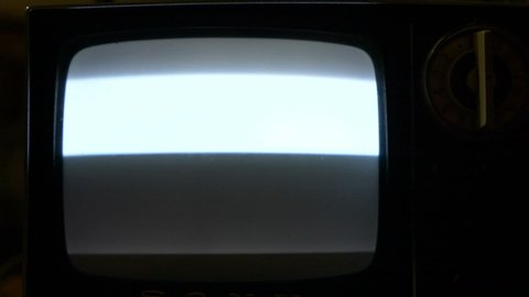 An old TV that flatlines when turned off