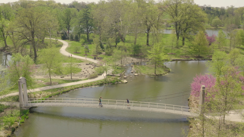 Aerial over a bridge in Forest Park in St. Louis, Missouri
