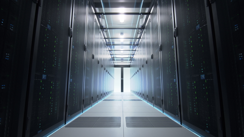 Camera slowly moving along the narrow corridor in data center with server equipment on both sides, the lights gradually turning off until total darkness. Photorealistic 3D render animation. Royalty-Free Stock Footage #1029880736