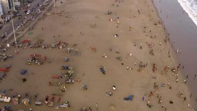 Sunset at the ocean beach, Puri, Orissa, India, 4k aerial drone footage
