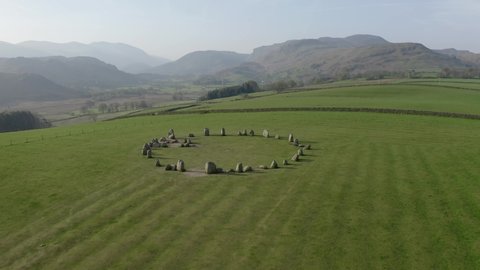 Castlerigg Stone Circle aerial parallax drone shot during the magic hour after Sunrise