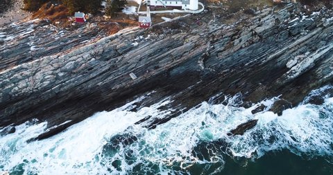 Aerial view of waves hitting the rocks in Curtis island lighthouse Camden Maine USA