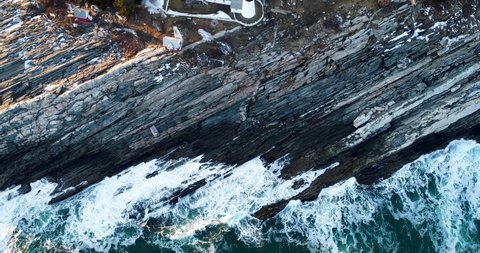 Extreme aerial view by the rocks in Curtis island lighthouse Camden Maine USA