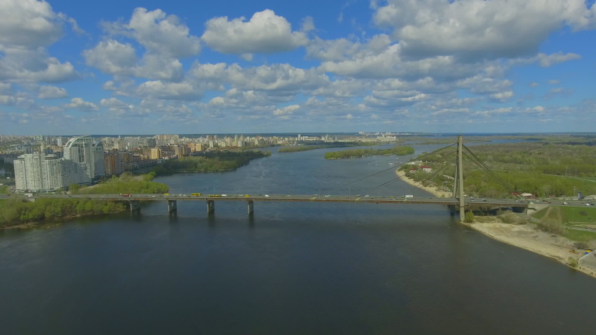 Traffic on the bridge over the river