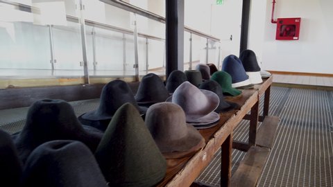 SAO JOAO DA MADEIRA, PORTUGAL - MAY 18, 2019:  Manufacturing head wear processes and machines in exhibition at the Chapelaria Museum during the International Museum Day.