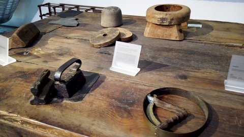 SAO JOAO DA MADEIRA, PORTUGAL - MAY 18, 2019:  Manufacturing head wear processes and machines in exhibition at the Chapelaria Museum during the International Museum Day.