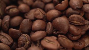 Coffee beans Macro shot view rotating background Slow motion video