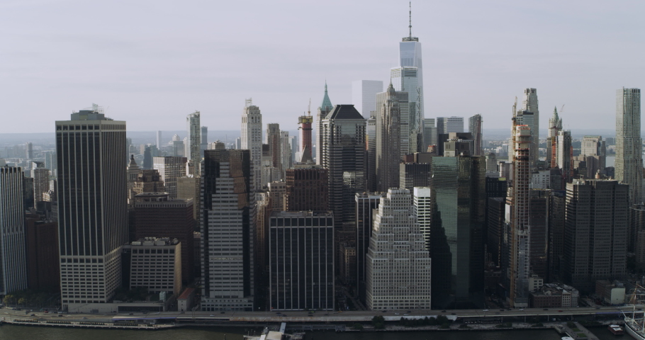 Incredible aerial view of New York City skyline coming to life with animated financial information related to stock market, stocks, trading, candlestick pattern, bear market, bull market, trading. Royalty-Free Stock Footage #1029949967