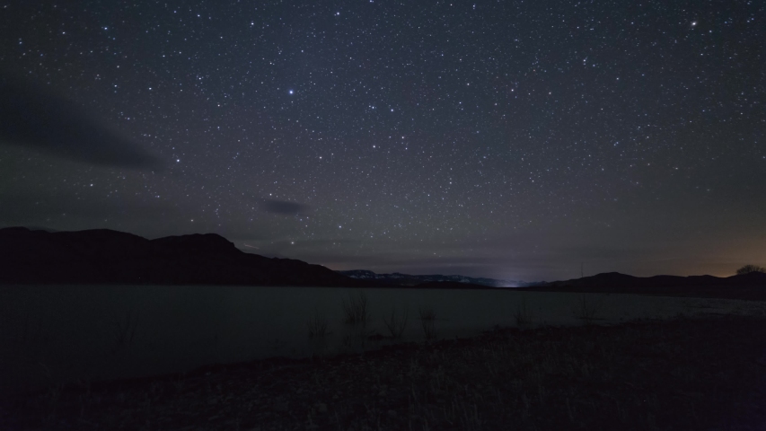 Time lapse of night sky over a lake in Utah | Shutterstock HD Video #1029953981