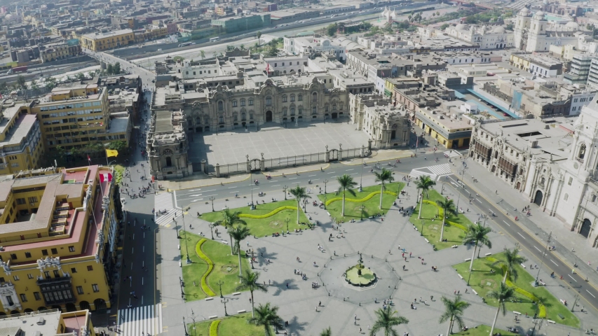 Aerial view of Lima main square, government palace of Peru and cathedral church. Tourists and people gathered at "Plaza de Armas" in the historic center capital of Peru.