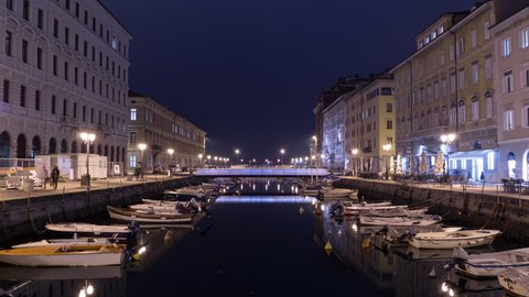 Italy, Trieste - April, 2016: Timelapse of the Canal Grande, in Trieste, at night.