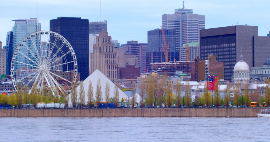 Montreal water front with boat crossing 