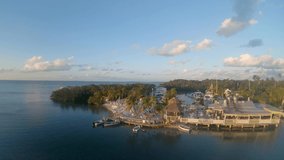 Ordbit aerial footage of a restaurant during a beautiful sunset on the island of Islamorada, Florida Keys, FL.