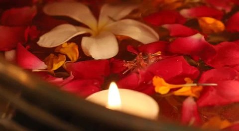Deepabali , Deepavali or Deepawali - the festival of lights, is widely celebrated in India. Rangoli Diyas and Flowers - colourful and decorated candles 
