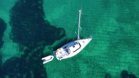 Aerial drone video of beautiful sail boat cruising the Ionian sea, Greece