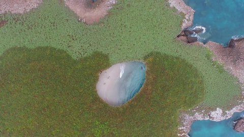 Aerial cenital wide shot of the hidden beach in the Marietas Islands, Nayarit, Mexico