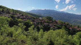 Aerial clip with traditional mountain village of Old Panteleimonas at the foot of Mount Olympus in Greece