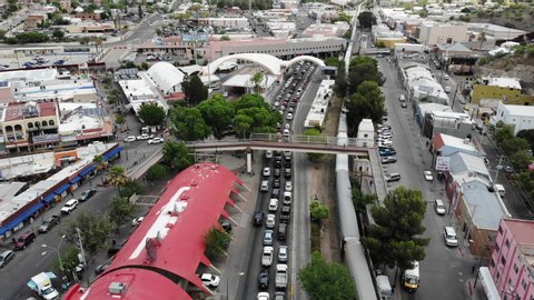 Drone footage of Mexico´s lines to the US Nogales, Arizona port of entry with sentry lanes very busy 