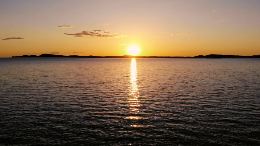 Sun setting in the horizon just off of the coast of Seattle Washington!