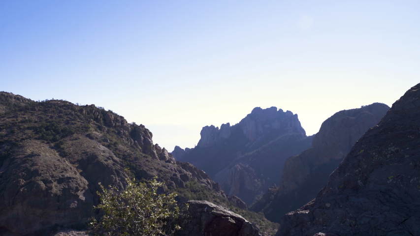 Push in shot at a ridge to Emory peak in the distance in the blue hour