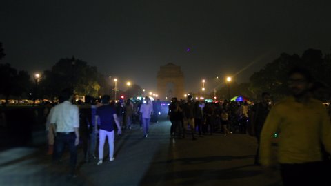Delhi, Delhi / India - September 2017: Bokeh shot at India Gate and people's activity.
