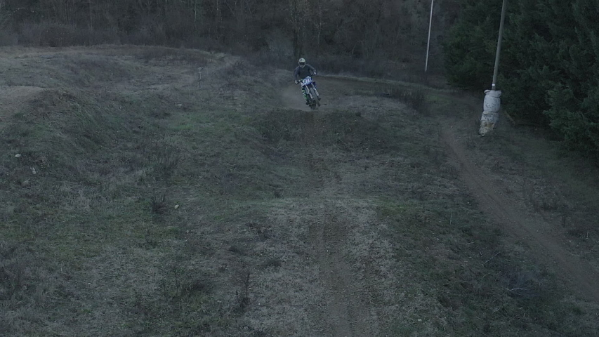 Motocross rider on a dirt track