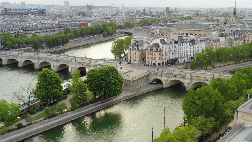 Aerial drone view of Paris, Seine river, Pont des Arts and Square du Vert-Galant